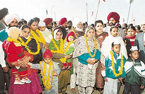 Relatives of Kargil who were honoured at the Red Cross mela in Patiala