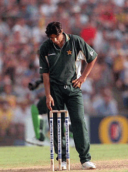Pakistan captain Wasim Akram shows his disappointment with the performance of his team in the One Day match against Australia at the Sydney Cricket Ground, Australia, Wednesday. At the tea break Australia was all out for 286, the third highest score for a one day match at the Sydney Cricket Ground. 
