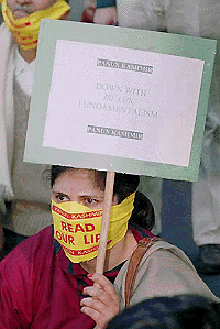 Kashmiri Pandits, members of Panun Kashmir, demonstrating near the Parliament House in New Delhi on Wednesday.  PTI 