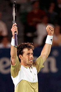 Francesco Clavet of Spain celebrates winning his centre court match against Goran Ivanisevic of Croatia at the Australian Open Tennis Championships in Melbourne, Australia on Thursday