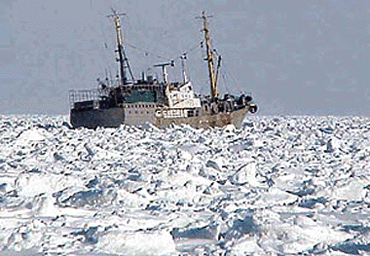 A Russian freighter is stranded amidst floating ice spreading over about 80 km along the Sea of Okhotsk, off the shore of Hokkaido, Japans nothernmost main island on Friday afternoon. The vessel is one of five stranded Russian freighters in the area. Six patrol boats from the Maritime Safety Agency are trying to help the freighters