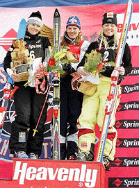 USA : Marja Elfman (left) of Sweden, Ann Battelle (centre) of Steamboat Springs, Colo., and Kari Traa of Norway (right) stand on the podium after finishing second, first and third, respectively, in the World Cup freestyle in South Lake Tahoe, California on Saturday