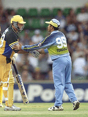 Shane Warne, (left) of Australia is congratulated by Sachin Tendulkar of India after hitting the winning runs in the one day match, Australia vs India at the WACA in Perth, Australia, on Sunday