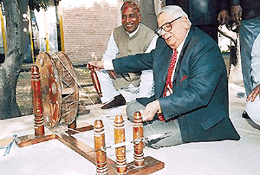 On the occasion of the martyrdom day of Mahatma Gandhi, the UT Administrator, Lieut-Gen J.F.R. Jacob (retd), tries his hand at a charkha in Chandigarh on Sunday.       Tribune photo by Karam Singh