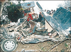 Remains of a Tata Sumo (left) and a Maruti Zen which were crushed under a heavily loaded truck at Dehru, near Ludhiana, on Sunday morning.