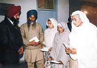 Parents of martyrs of the Kargil conflict who were given financial assistance by a US-based NRI in Chandigarh on Tuesday  Tribune photo by Pankaj Sharma