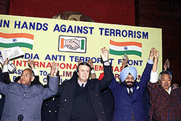 All-India Anti-Terrorist Front Chairman M.S. Bitta, Mr L.M. Singhvi, MP and diplomats join hands against terrorism at a seminar on Terrorism: the biggest challenge to human existence at