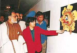 Kavita Singh (in centre) explaining her work