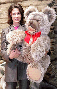    A special edition of a teddy bear called "Zotty" from the German Steiff company is shown by Verena Brozat, at the "51st International Toy Fair Nuremberg" in Germany on Thursday. The handmade bear costs 1600 marks ($ 800).  AP/PTI