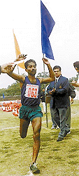 Anil Kumar winning the full marathon