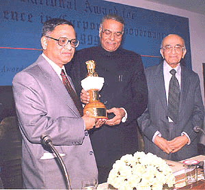 Union Finance minister Yashwant Sinha presenting the first National award for Excellence in Corporate Governance to N.R. Narayanamurthy, Chairman of the Infosys Technologies Ltd. in New Delhi on Tuesday. The award is sponsored by the Unit Trust of India. Credit: Sondeep Shankar