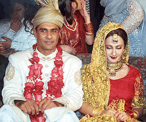 Waqar Younus, ace bowler of Pakistani cricket team with his newly wed wife, Faryal Shaheen in Lahore on Friday
