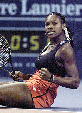 American tennis player Serena Williams, reacts after making a point against French tennis player Julie Halard-Decugis, during their semi-final match at the Indoor Paris Open tennis tournament in Paris, France, on Saturday
