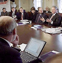 President Clinton meets with representatives of the Internet and technology community to explore ways to tighten security on the World Wide Web in the Cabinet Room of the White House, on Tuesday. AP/PTI