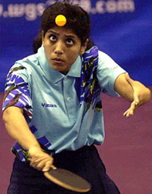India's Ghosh Mantu serves against Australia's Miao Miao during a singles match at the 14th Commonwealth Table Tennis Championships held at the Toa Payoh Sports Hall on Wednesday.