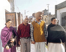 Jagmohan and Balbir with their sons