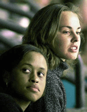 Tennis player Martina Hingis, (right) watches the Pittsburgh Penguins play the Tampa Bay Lightning during the third period on Monday night, at the Ice Palace in Tampa, Fla