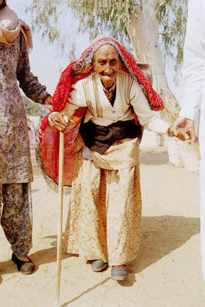 105 year old Dhabo Devi mother of former Chief Minister of Haryana Bansi Lal coming to cast her vote at a polling station in Golabagh, Haryana on Tuesday