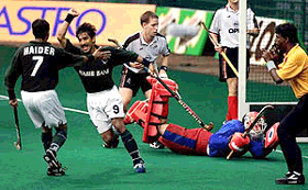 Pakistan's Syed Haider Hussain (left) and Kamran Ashraf cheers victory after latter's goal in their game against Germany during the 10th Sultan Azlan Shah Cup men's field hockey tournament in Kuala Lumpur on Wednesday