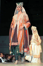 A model displays a gown designed by India's Ritu Kumar during the Tree of Life fashion show, part of the India into the New Millennium Fashion Extravaganza in Hong Kong oN Saturday
