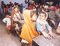 An excited and animated set of 'new' students attend a night school, a scheme that got underway on Tuesday evening at the Government High School, Sector 25, Chandigarh