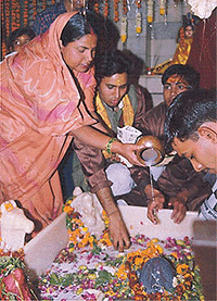 Devotees pour water on a Shivalingam on Saturday to mark Shivratri