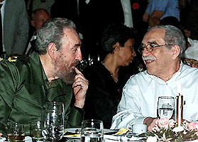 President Fidel Castro, left, and Colombian writer Gabriel Garcia Marquez speak during a dinner in Havana on Friday evening. Cuba was celebrating the international cigar festival