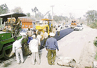 Work of recarpeting and improving the quality of the Kalka-Ambala National Highway-22, in progress near the Panchkula barrier in Zirakpur.	