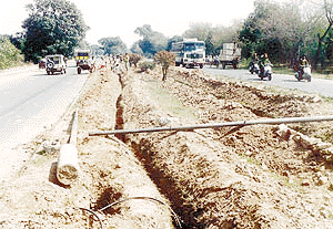 Streetlight poles and underground cables have been dug up following widening of Purv Marg. New and bigger poles will come up on this road in a phased manner within next four to six weeks. This Tribune photograph was taken by Manoj Mahajan on Monday.