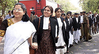 Women lawyers court arrest forming human chain near India Gate in New Delhi on Tuesday
