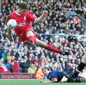 Liverpool striker Erik Meijer rises above the Sunderland defence only for his header to go wide during their FA Premiership match at Anfield in Liverpool on Saturday. The teams drew 1-1. AP