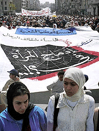 An estimated half a million fundamentalists demonstrate in Casablanca, Morocco, over a government plan to reform women's status, on Sunday. The plan, that divides the North African kingdom, would fully replace the practice of repudiation with court divorce and would also support a literacy programme for rural women