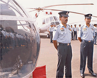 The contingent of Indian Air- Force troops for the UN Peace Keeping Mission for Sierra Leone (West Africa) stands in front of a helicopters in New Delhi on Monday before leaving for Sierra Leone. Eight helicoptors, including four Mi8 and four Chetak, and 149 personnel, including thirty officers, were part of the contingent