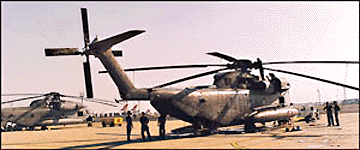 US Air Force engineers and Marines preparing their CH-53 helicopters at the Indian Air Force base in New Delhi on Wednesday. Five US Air Force helicopters are stationed in New Delhi to be used for escort duty of US President Bill Clinton.