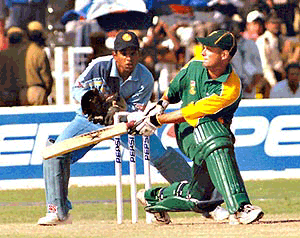 Kristin of South Africa sweep's a ball. He was the highest scorrer from his side, in the third one day match in faridabad today