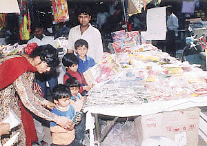 Kids choose Holi 'material' in Sector 7, Panchkula, on Friday.  A Tribune photograph