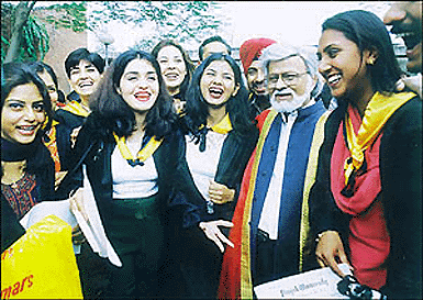 Students of the Government College of Art share a light moment with Satish Gujral, a renowned artist, after the convocation of the college in Chandigarh on Wednesday.