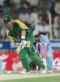 South Africa's Herschelle Gibbs during his country's cricket match against India in the Sharjah cricket grounds, UAE, on Wednesday. It was the first match in the Sharjah cricket 2000 tournament , which ends on March 31