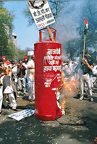 Congress workers hold a demonstration against the recent price hike in New Delhi on Saturday