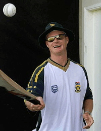 South Africa's Lance Klusener amuses himself bouncing a cricket ball on his bat, before taking part in his team's last practice at the Sharjah cricket ground, UAE, Thursday