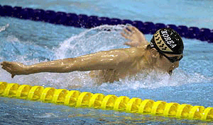 South Korean swimmer Han Kyu-chul swims to win a gold medal in the men's 200m butterfly of the 6th Asian Swimming Championships, at the Sajik Pool in the Pusan city, 400km southeast of Seoul, Thursday. He got a gold medal with a time of 2.00,62minutes in this event