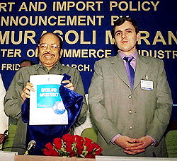 Union Minister of Commerce and Industry Murasoli Maran releasing the Exim policy flanked by his deputy, Mr Omar Abdullah, in New Delhi on Friday.  PTI photo