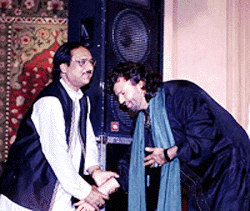 Ghazal maestro Ghulam Ali is greeted by Punjabi singer Hansraj Hans at the Punjab Hungama organised by the Rotary Club, Chanakyapuri, in New Delhi on Friday night