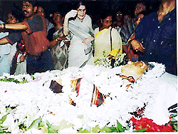 The body of noted Rabindra Sangeet exponent Kanika Bandyopadhyay being taken to Shantiniketan in a flower-decked carrier from Calcutta on Wednesday.