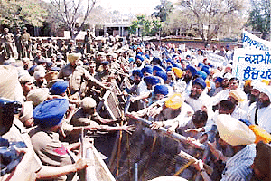 Shriomani Akali Dal (panthic) activists protesting against the Punjab Chief Minister, Mr Parkash Singh Badal, for the ongoing religio-political crisis in Punjab at Chandigarh on Wednesday.