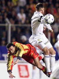 Arif Erdem of Galatasaray (left) fights for the ball with Lee Bowyer of Leeds United during their UEFA Cup semifinal match in Istanbul on Thursday.