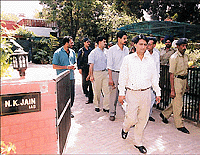 CBI officials leave after sealing the house of Mr N.K. Jain, Home Secretary, UT, in Sector 7 in Chandigarh on Friday
