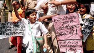 Family members of taxi and autorickshaw owners demonstrating against the Supreme Court decision to ban on eight years old commercial vehicles, in New Delhi on Friday