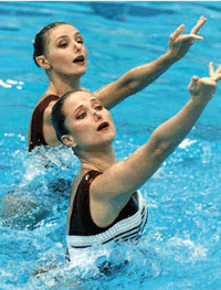 Olga Brousnikina (rear) and partner Maria Kisseleva of the Russian Federation compete in the Duet Technical Routine at the Synchro 2000 Olympic Qualifying Open in Sydney, 10 April 2000