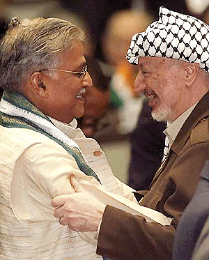 Union Human Resources and Development Minister Murli Manohar Joshi and Palestinian leader Yasser Arafat greet each other at the inauguration of the South Summit of developing nations in Havana on Wednesday. AP/PTI